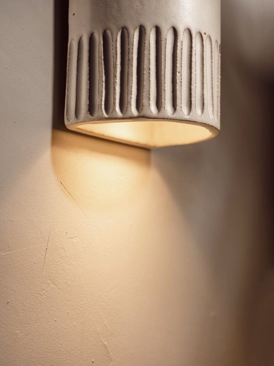 Ceramic wall store sconce